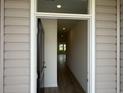View through the front door showcases the home's light and airy interior with recessed lighting at 1029 Jase Dr., Longs, SC 29568