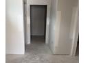 Unfinished hallway featuring neutral walls and doorways, awaiting final touches and personal touches at 1033 Jase Dr., Longs, SC 29568
