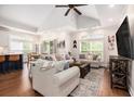 Open concept living room with high ceilings, lots of natural light, and hardwood floors at 1379 Cottage Dr., Myrtle Beach, SC 29577