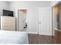 Bedroom with dresser, TV, and doorway to adjacent spaces at 200 53Rd Ave. N # 511, North Myrtle Beach, SC 29582