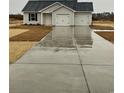 Charming single-Gathering home featuring a two-car garage and freshly laid lawn at 2247 Union Church Rd., Little River, SC 29566