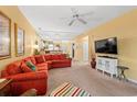 This light-filled living room has an open floor plan that leads to the kitchen, perfect for entertaining at 601 Hillside Dr. # 4424, North Myrtle Beach, SC 29582