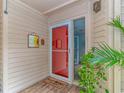 Cozy entryway with 'Welcome' mat and decorative wall hangings, complemented by vibrant greenery at 9551 Edgerton Dr. # C-6, Myrtle Beach, SC 29572