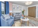 Comfortable living room with a view and charming, beach-themed decorative accessories at 1501 S Ocean Blvd. # 1250, Myrtle Beach, SC 29577