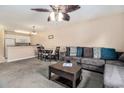 Open living space with couch, dining area, and kitchen, ideal for entertaining at 2101 Firebird Ln. # 14, Myrtle Beach, SC 29577