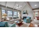 Inviting living room with waterfront views, fireplace, comfortable seating, and stylish decor at 24 Frigate Ct., Pawleys Island, SC 29585