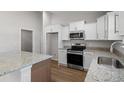 Well-equipped kitchen boasts stainless steel appliances, granite countertops, and ample cabinet space at 271 Stillbrook Dr., Longs, SC 29568