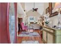 Inviting foyer featuring hardwood floors, high ceilings, and an open view to the living room at 372 Waterfall Circle, Little River, SC 29566