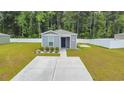 A single-story home with a concrete driveway and a well-maintained front yard at 478 Samara Dr., Longs, SC 29568