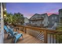 Spacious deck with comfortable seating, offering a relaxing outdoor space with views of the neighborhood at 6001 - B7 S Kings Hwy., Myrtle Beach, SC 29575