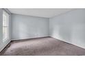 Bright, carpeted bedroom with a large window and neutral walls providing ample natural light at 1108 Chicora Blvd., Conway, SC 29526