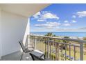 Balcony overlooking palm trees, a lawn, and a beautiful beach with ocean views at 2000 N Ocean Blvd. # 315, Myrtle Beach, SC 29577