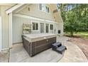 Relaxing backyard patio with a hot tub, offering a private outdoor retreat at 206 Dogwood Dr., Myrtle Beach, SC 29575