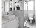 Stylish bathroom featuring modern fixtures, marble-look tile, and a glass-enclosed shower at 306 Salt Marsh Circle # 5A, Pawleys Island, SC 29585