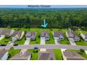 Aerial view of a neighborhood showcasing the manicured lawns and community layout at 306 Southgate Ct., Pawleys Island, SC 29585