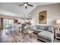 Open-concept living space with modern finishes, vaulted ceiling, and seamless flow to the dining area and kitchen at 364 Copperwood Loop, Conway, SC 29526