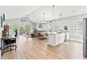 Spacious open-concept living area combining the kitchen, dining, and living room; ample natural light at 4363 Bayshore Dr., Little River, SC 29566