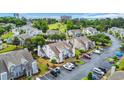Aerial view of the community with townhouses, golf course, and ocean view at 503 20Th Ave. N # 46 B, North Myrtle Beach, SC 29582