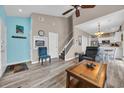 Cozy living area with new floors, a staircase, and an adjacent kitchen for easy flow at 503 20Th Ave. N # 46 B, North Myrtle Beach, SC 29582