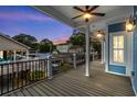 Relaxing outdoor space on this balcony with a ceiling fan at 6001 - 1793 S Kings Hwy., Myrtle Beach, SC 29575