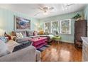Comfortable living room with hardwood floors, and a ceiling fan at 908 Wood St., North Myrtle Beach, SC 29582