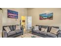 Inviting living room area with comfortable seating and beach-themed decor at 9780 Leyland Dr. # 112, Myrtle Beach, SC 29572