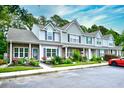 Attractive townhomes with beautiful landscaping, brick accents, and coordinated exterior colors at 990 Palisade Circle, Myrtle Beach, SC 29577