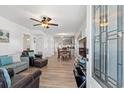 Open-concept living space showcasing modern flooring, furniture, and natural light throughout at 1622 Havens Dr., North Myrtle Beach, SC 29582