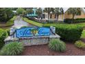 Community welcome sign for Abaco Cove in front of lovely canal and attractive landscaping at 374 Graytwig Circle, Murrells Inlet, SC 29576