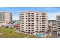 A spacious condo with a pool and balcony offers stunning views and a relaxed atmosphere at 5800 N Ocean Blvd. # 405, North Myrtle Beach, SC 29582