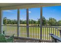 Enjoy this incredible golf course view from the condo's spacious covered screened porch at 650 River Oaks Dr. # 46I, Myrtle Beach, SC 29579