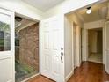 Welcoming foyer showcasing beautiful hardwood floors and ample natural light at 816 Kittiwake Ln., Murrells Inlet, SC 29576
