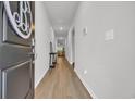 Inviting hallway with wood floors leads to a bright and open living space at 112 Carolina Lakes Blvd., Myrtle Beach, SC 29588