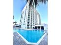 Outdoor pool and sundeck area with lounge chairs at Ocean Park Resort at 1905 S Ocean Blvd. # 922-924, Myrtle Beach, SC 29577
