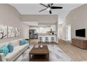 Bright living room with modern decor that flows into the kitchen area at 4339 Baldwin Ave. # 4339, Little River, SC 29566