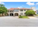 Beautiful mediterranean-style home with ample parking and well-maintained landscaping at 807 N Waccamaw Dr., Murrells Inlet, SC 29576