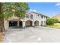 Mediterranean-style home featuring unique architectural design and spacious driveway at 807 N Waccamaw Dr., Murrells Inlet, SC 29576