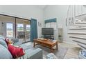 Bright living room with a sliding glass door that opens to the balcony at 207 Double Eagle Dr. # F-3, Myrtle Beach, SC 29575