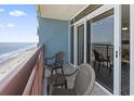 Relax on the balcony with chairs and admire the ocean view from this cozy balcony at 2201 South Ocean Blvd. # 1808, Myrtle Beach, SC 29577