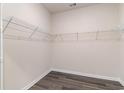 Walk-in closet, complete with white ventilated metal shelving, maximizing storage space at 4458 East Coast Ln., Shallotte, NC 28470
