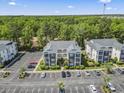 Aerial view showcasing the community with well-maintained landscaping and convenient parking at 1290 River Oaks Dr. # 7H, Myrtle Beach, SC 29579