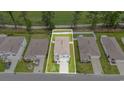 Aerial view of a home showcasing its layout, surrounding greenery, and neighborhood at 2059 Borgata Loop, Longs, SC 29568
