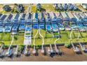 Aerial view of waterfront homes featuring private pools and docks, perfect for boaters and water enthusiasts at 437 Saint Julian Ln., Myrtle Beach, SC 29579