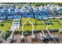Stunning aerial view of waterfront homes with private pools and boat docks at 441 Saint Julian Ln., Myrtle Beach, SC 29579