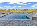 Beautiful infinity pool with an integrated spa and stunning lake view at 441 Saint Julian Ln., Myrtle Beach, SC 29579
