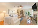 Comfortable living room with white sofas, fireplace, hardwood floors, and stylish decor at 8 Martinique Dr., Myrtle Beach, SC 29572