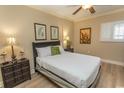 The bedroom boasts neutral walls, a cozy bed, and matching lamps on the nightstands at 100 North Beach Blvd. # 1902, North Myrtle Beach, SC 29582