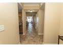 The hallway features tiled floors and leads to a living area with a view of the ocean at 100 North Beach Blvd. # 1902, North Myrtle Beach, SC 29582