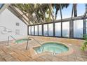Relaxing indoor hot tub area with two 3-foot deep tubs under a greenhouse-style enclosure at 1105 S Ocean Blvd. # 814, Myrtle Beach, SC 29577