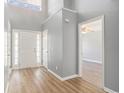 Entryway featuring wood floors, high ceilings and a storm door with lots of natural light at 1196 Harvester Circle # 1196, Myrtle Beach, SC 29579